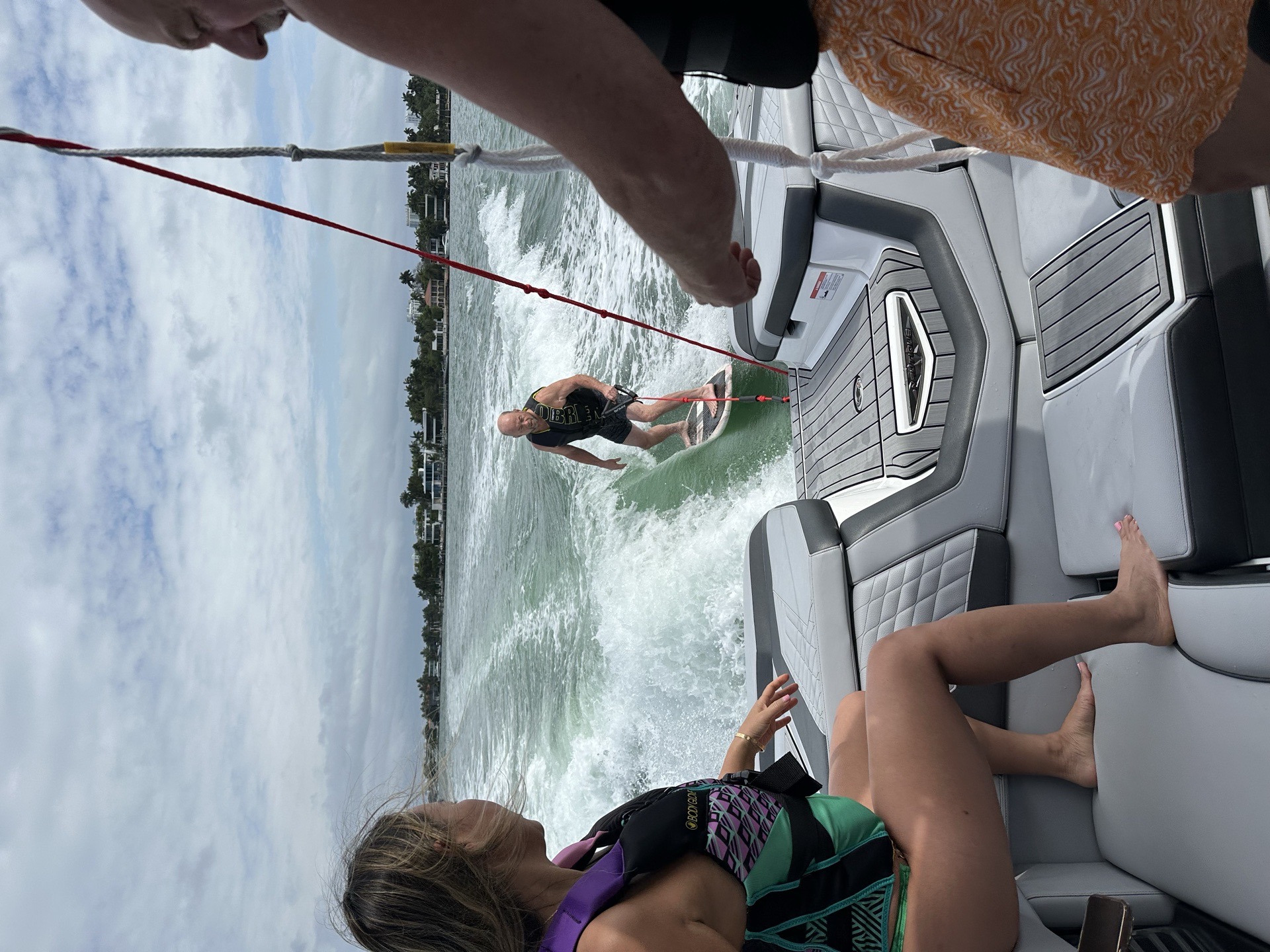 WakeXscape crew giving guidance aboard the boat